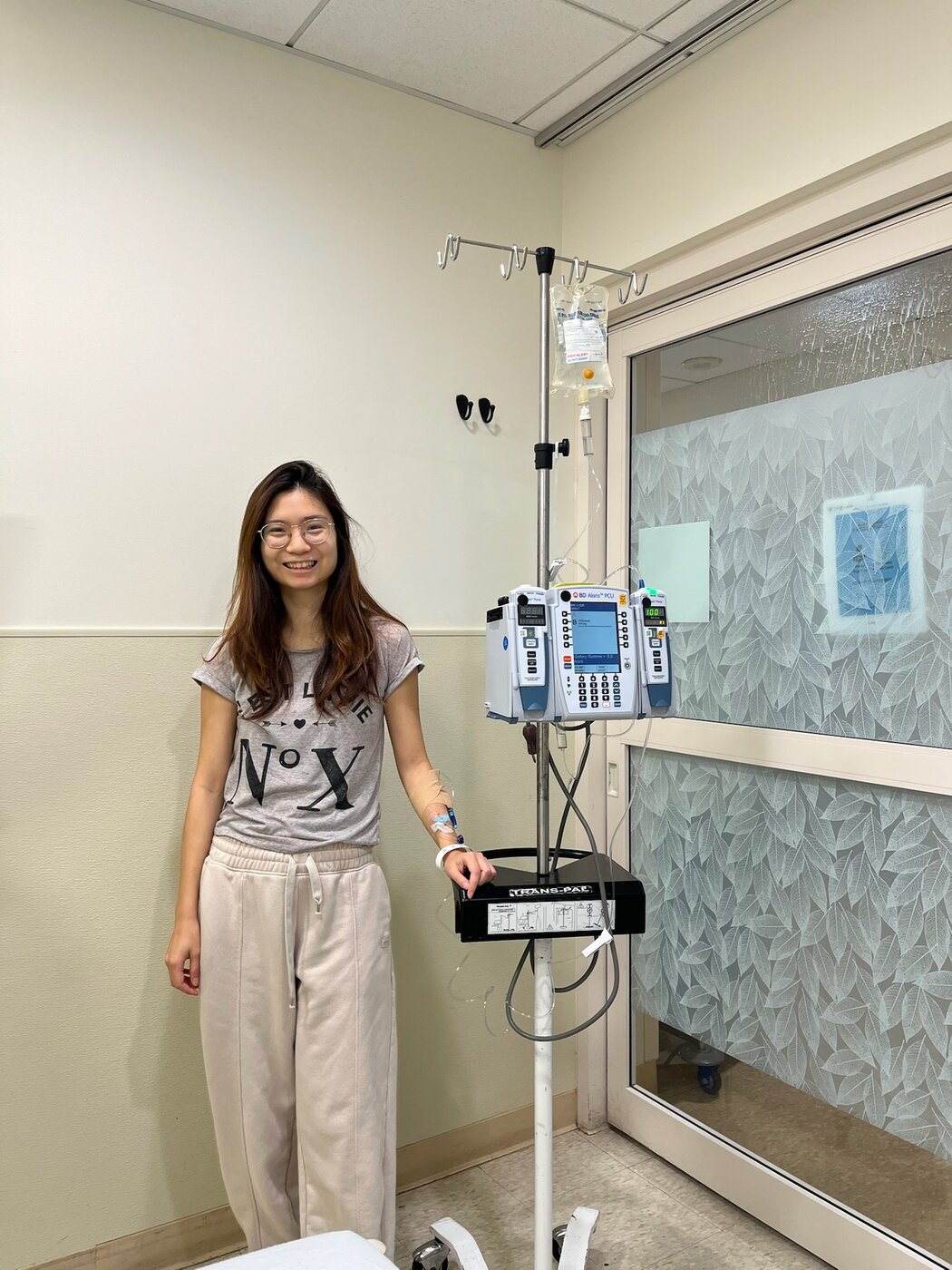 Karis with her IV pole during chemotherapy