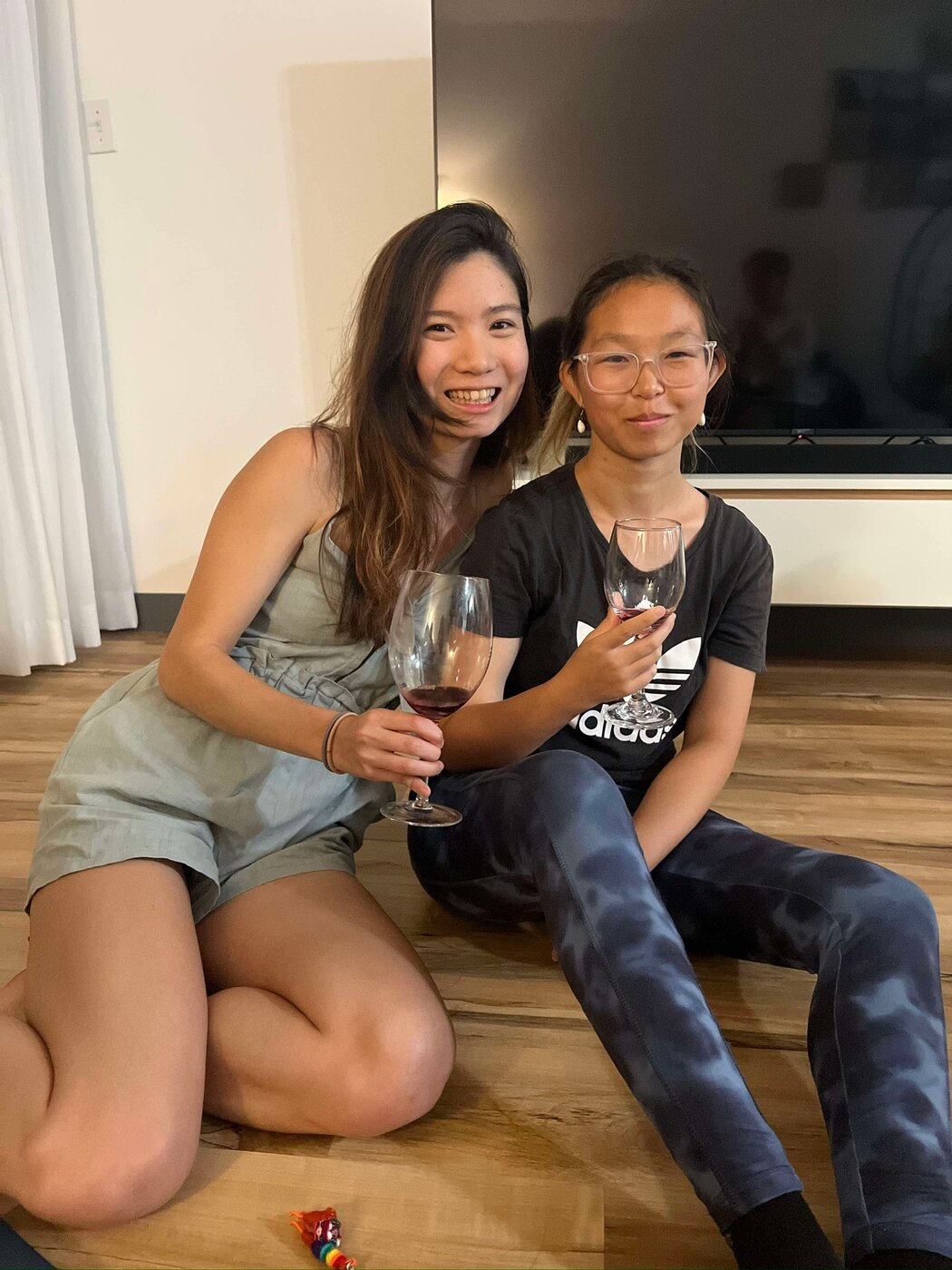 Karis with a close friend at home